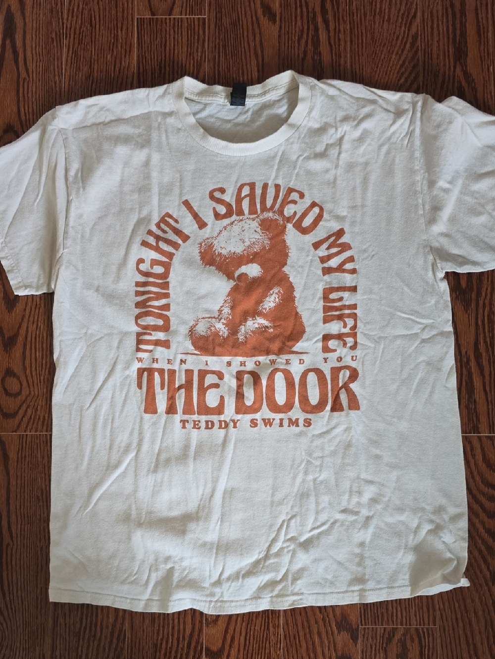 Teddy Swims Off White Graphic Tee with Orange Teddy Design